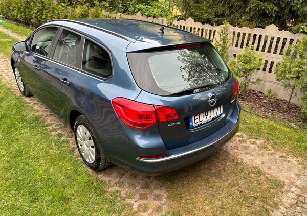 Opel Astra cena 17400 przebieg: 299000, rok produkcji 2012 z Miejska Górka małe 11